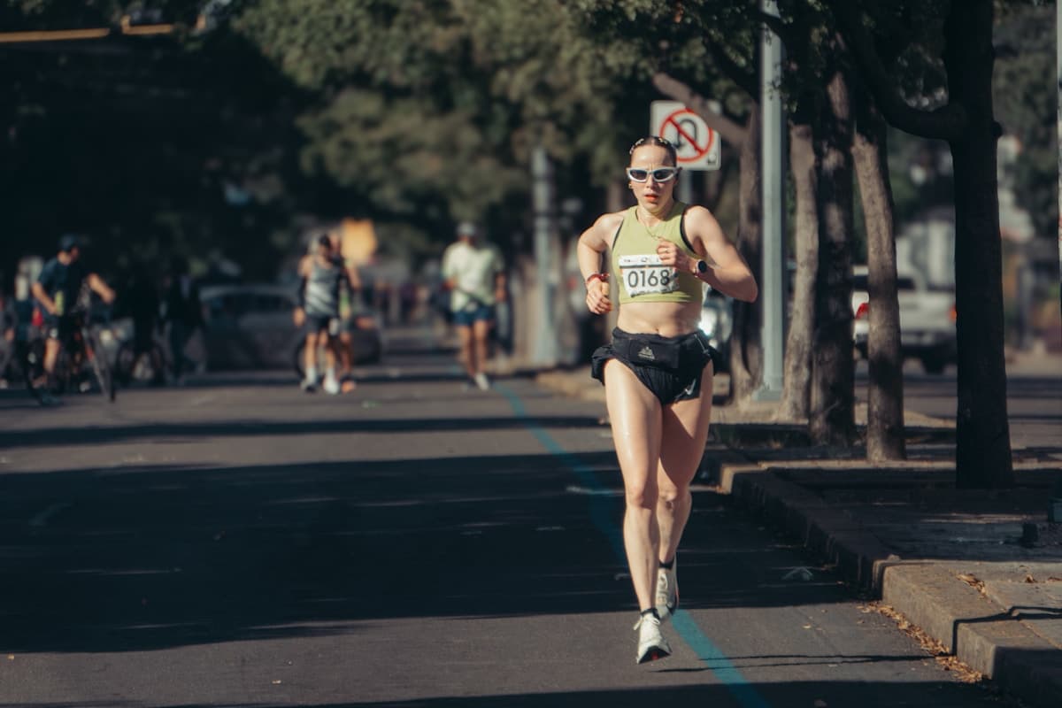 Woman running in a race — Leilani Dunmoyer, HD advocate and marathon runner