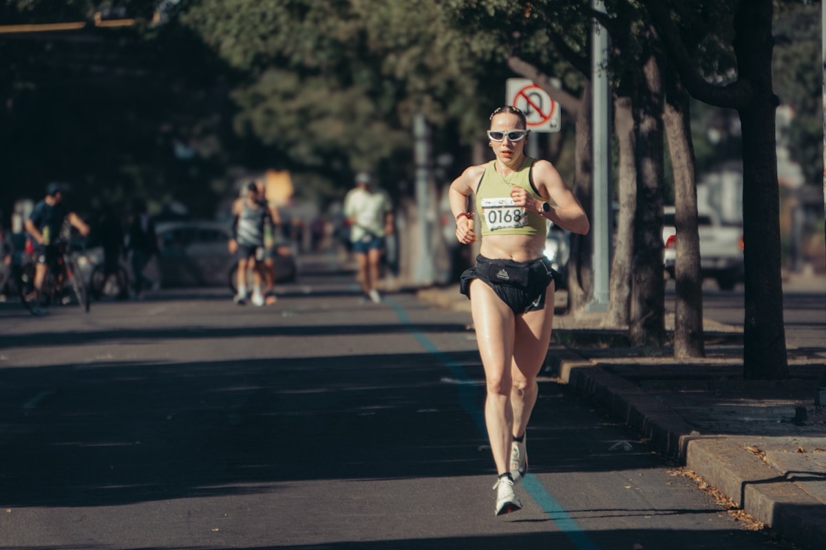 Woman running in a race — Leilani Dunmoyer, HD advocate and marathon runner