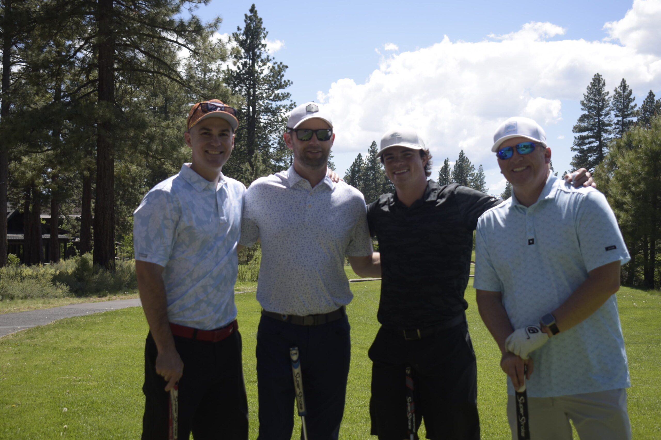 NVforHD 2024 charity tournament group on fairway, pine forest