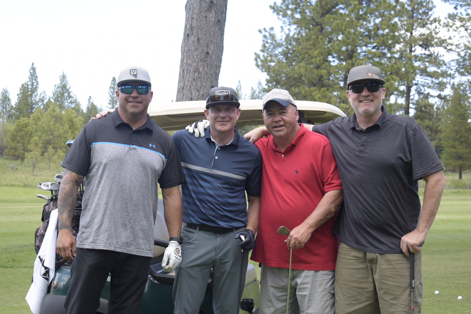 NVforHD 2024 inaugural tournament hole, Sierra Nevada pines backdrop